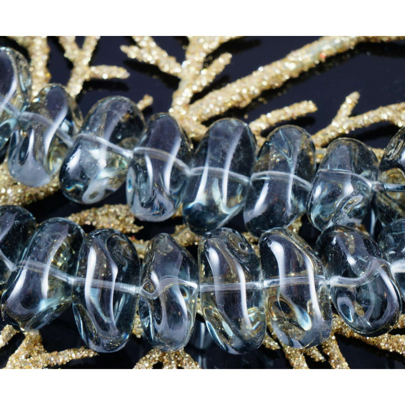 Velké oválné korálky z českého skla zatočené, průhledné, šedé, s jednou dírkou rozměry 18mm x 9mm 4 kusy