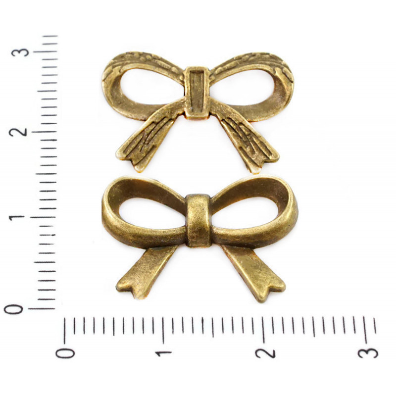 Kovový přívěsek ve tvaru mašličky bronzový starožitný vzhled rozměry 21 mm x 14 mm 4 kusy